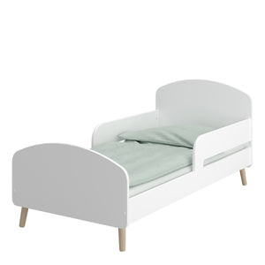 Gaia Toddler Bed 70x140 cm in Pure White Furniture To Go 1013606450058 5707252084530 Introducing the Gaia Toddler Bed in White: Where style meets comfort and safety. The bed's modern design features oak legs, adding a touch of natural beauty to your little one's room. Crafted with durable oak and MDF wood in a pristine white hue, it exudes elegance and versatility, effortlessly complementing any nursery decor. Moreover, with soft shapes ensuring safety by preventing dangerous edges, you can rest peacefully,