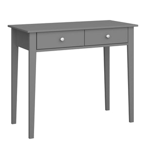 Tromso desk 2 drawers Gray in Grey Furniture To Go 1013740760072 5707252116118 Upgrade your office space with the Tromso 2-drawer desk. This stylish grey desk showcases a timeless Scandinavian design, complete with polished stainless steel handles for a touch of sophistication. Made with solid MDF and finished with a sleek, easy-to-clean surface, it's both functional and stylish. Enjoy the smooth gliding action of underslung runners and the added touch of a matching interior drawer lining. With its attracti