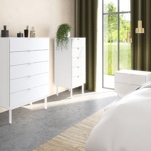 Soma 5 Drawers Narrow Chest Granulated pure White Brushed White Furniture To Go 1014120050230 5707252085308 Introducing the Soma Range in White: Elevate your home with contemporary sophistication. With its elegant white design, robust construction, and versatile style, Soma in White is the ideal choice for any room. Upgrade your living spaces and embrace the perfect fusion of modern charm and functionality with the Soma Range in White. Dimensions: 508mm x 1113mm x 412mm (Height x Width x Depth) 
 Large stor