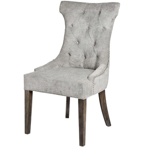 Silver High Wing Ring Backed Dining Chair in SILVER Hill Interiors 18333 5050140833391 Sumptuous and luxurious design Handcrafted Beautifully made and incredibly stylish White glove delivery Dimensions: 102cm x 57cm x 62cm Weight: 10.4kg Volume: 0.28CBM This is item is built with a Rubberwood Frame, Known for its dense grain and strength, it is perfect for this item. The Fabric is comprised of Nylon and Polyester. All upholstered items have passed UK fire safety regulations with cigarette and match test cer