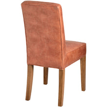 Load image into Gallery viewer, Tan Faux Leather Dining Chair in BROWN Hill Interiors 18334 5050140833490 High quality faux leather Handcrafted Beautifully made and incredibly stylish Dimensions: 96cm x 64cm x 48cm Weight: 7.5kg Volume: 0.21CBM This is the Tan Faux Leather Dining Chair, this is a gorgeous item of seating that is both luxurious and practical too. The tan colour is very on trend and would look beautiful in many interiors.