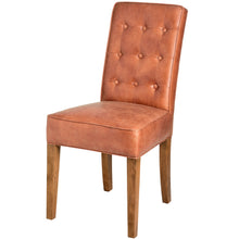 Load image into Gallery viewer, Tan Faux Leather Dining Chair in BROWN Hill Interiors 18334 5050140833490 High quality faux leather Handcrafted Beautifully made and incredibly stylish Dimensions: 96cm x 64cm x 48cm Weight: 7.5kg Volume: 0.21CBM This is the Tan Faux Leather Dining Chair, this is a gorgeous item of seating that is both luxurious and practical too. The tan colour is very on trend and would look beautiful in many interiors.