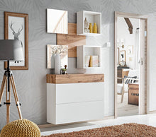 Load image into Gallery viewer, Easy V Hallway Set Arte-N WTW EY5 With two mirrors, two open compartments a shoe cupboard, this functional furniture set adds practicality style to your hallway. The spacious wall panel has contemporary rectangular edges is finished in a stylish combination of white matt timeless Oak Wotan. Total W100cm x H190cm x D30cm Colour: Front: Oak Wotan White Gloss Carcass: Oak Wotan White Matt Two Open Compartments Mirror Drawer Shoe Cabinet Made from 16mm high-quality laminated board Assembly Required Weight: 62kg