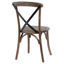 Load image into Gallery viewer, Cross Back Dining Chair in BROWN Hill Interiors 20571 5050140057186 Solid oak Handcrafted White glove delivery Dimensions: 88cm x 42cm x 41cm Weight: 2.2kg Volume: 0.6CBM This is the Cross Back Dining Chair, this seat has been designed in Elm with practicality and comfort in mind, ensuring it would make a great, hard-wearing, dining chair. It features a cross-back design which adds to the comfort of the product while the black finish of the metal gives a subtle industrial feel. The chair has been finished w