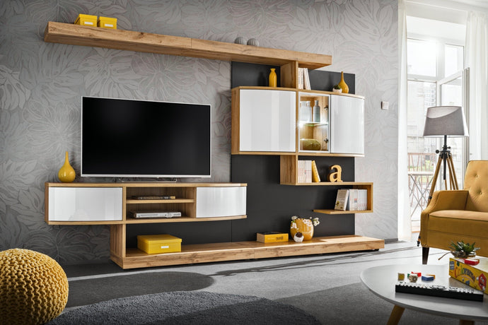 Palermo Entertainment Media Wall Unit Arte-N 20 WTANW PM This entertainment unit is perfect for any modern home. It features ample space in the form of shelves, closed compartments display sections to make sure you can make the most out of its beautiful design. It doesn't only capture the eyes with its unique structure beautiful colours, it also captivates your lifestyle because of its versatile configuration. W300cm x H182cm x D45cm Colour: Carcass in Wotan Oak Fronts - PVC White High Gloss Wall Panel in A