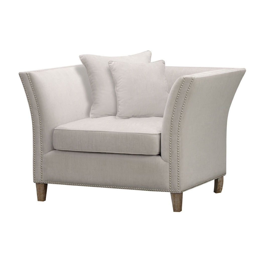 Vesper Cushion Back Snuggle Chair in GREY Hill Interiors 21446 5050140144688 Soft grey fabric Handcrafted Stud detailing White glove delivery Dimensions: 74cm x 120cm x 91cm Weight: 20kg Volume: 0.92CBM This is the Vesper Cushion Back Snuggle Chair. The Vesper range, comprised of three matching items, is a timeless grey fabric suite. Its sumptuous snuggle chair and three seater sofa invite instant relaxation. The serene, light grey fabric is as soft on the eye as it is to the touch. Finished with subtle sil