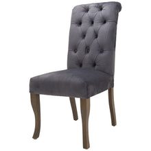 Load image into Gallery viewer, Knightsbridge Roll Top Dining Chair in GREY Hill Interiors 21510 5050140151082 Sumptuous velvet Handcrafted Ring back detailing White glove delivery Dimensions: 105cm x 49cm x 71cm Weight: 7.9kg Volume: 0.26CBM This is the Knightsbridge Roll Top Dining Chair. A sumptuous button pressed velvet chair in a timeless gret colour with roll-top detail and silver ring pull that will add elegance and class to a variety of interiors. Built from a rubberwood frame, known for its dense grain and strength, it is a sturd