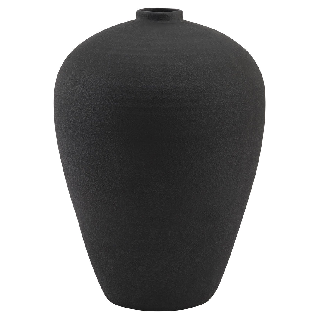 Matt Black Tall Astral Vase in BLACK Hill Interiors 22901 5050140290187 Dimensions: 57cm x 40cm x 40cm Weight: 10kg Volume: 0.15CBM This is the Matt Black Tall Astral Vase. This matt black vase is large enough to be floor-standing if desired and looks great styled together with an alternate size in the same finish for a staggered height display. Slim-necked, they need little foliage to complete their pared- back, contemporary aesthetic.