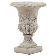 Load image into Gallery viewer, Fluted Stone Ceramic Urn in STONE Hill Interiors 22984 5050140298480 Dimensions: 25cm x 20cm x 20cm Weight: 2kg Volume: 0.07CBM This is the Fluted Stone Ceramic Urn. Sculptural and impactful, this stylish stone effect urn is everything an entryway needs for instant wow-factor. Display it as is or fill with faux florals to make a lasting impression. Matching larger size urn available.