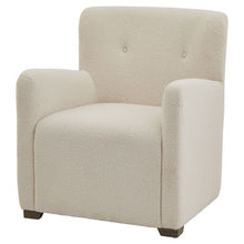 Load image into Gallery viewer, Lingfield Bouclé Armchair in CREAM Hill Interiors 22996 5050140299685 White glove delivery Dimensions: 84cm x 74cm x 81cm Weight: 19.9kg Volume: 0.48CBM Wrapped in sumptuously soft boucle fabric, the Lingfield Armchair invites you to sink into its plush embrace and unwind in style. Its tactile appeal adds depth and visual interest to any room, while the subtle mid-tone wood stain of its legs enhances its modern aesthetic.