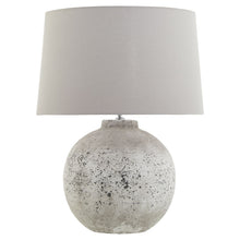 Load image into Gallery viewer, Tiber Large Stone Ceramic Lamp in STONE Hill Interiors 23029 5050140302989 Dimensions: 72cm x 54cm x 54cm Weight: 6.5kg Volume: 0.09CBM This is the Tiber Large Stone Ceramic Lamp. A timeless stone effect table lamp with flecked detailing which complete with a light grey fabric shade. This elegant table lamp will pair perfectly with both country and modern neutral homes. This lamp takes an E14 screw bulb and comes complete with shade and in-line switch.