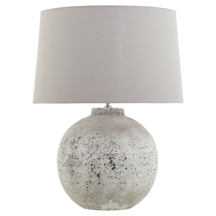 Tiber Large Stone Ceramic Lamp in STONE Hill Interiors 23029 5050140302989 Dimensions: 72cm x 54cm x 54cm Weight: 6.5kg Volume: 0.09CBM This is the Tiber Large Stone Ceramic Lamp. A timeless stone effect table lamp with flecked detailing which complete with a light grey fabric shade. This elegant table lamp will pair perfectly with both country and modern neutral homes. This lamp takes an E14 screw bulb and comes complete with shade and in-line switch.