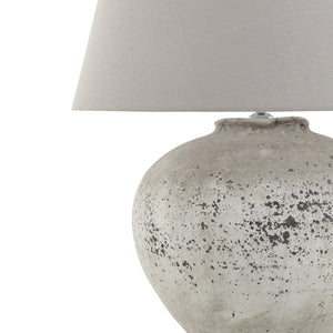 Regola Large Stone Ceramic Lamp in STONE Hill Interiors 23030 5050140303085 Dimensions: 64cm x 49cm x 49cm Weight: 5kg Volume: 0.07CBM This is the Regola Large Stone Ceramic Lamp. A timeless stone effect table lamp with flecked detailing which complete with light grey fabric shade. This elegant table lamp will pair perfectly with both country and modern neutral homes. This lamp takes an E14 screw bulb and comes complete with shade and in-line switch.