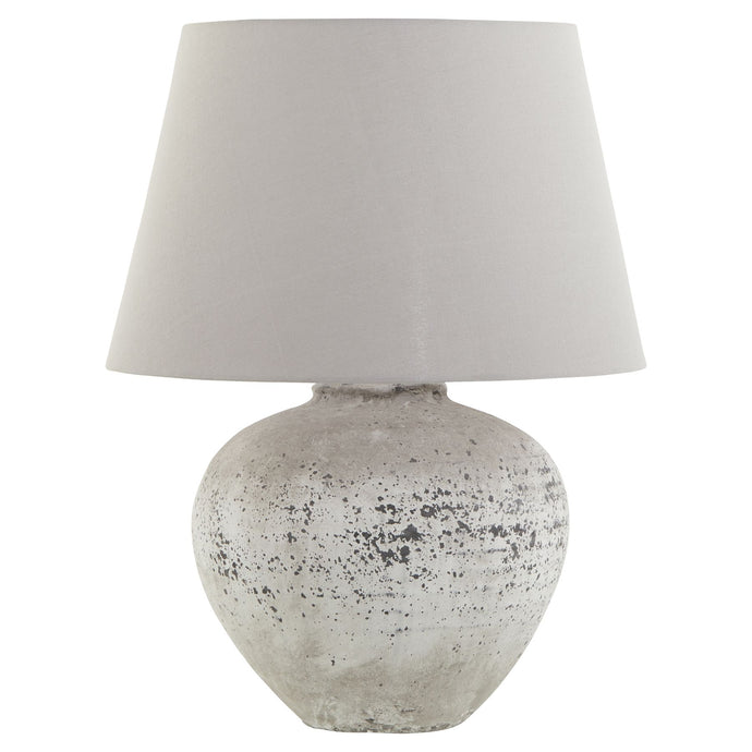 Regola Large Stone Ceramic Lamp in STONE Hill Interiors 23030 5050140303085 Dimensions: 64cm x 49cm x 49cm Weight: 5kg Volume: 0.07CBM This is the Regola Large Stone Ceramic Lamp. A timeless stone effect table lamp with flecked detailing which complete with light grey fabric shade. This elegant table lamp will pair perfectly with both country and modern neutral homes. This lamp takes an E14 screw bulb and comes complete with shade and in-line switch.