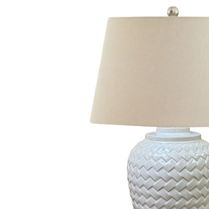 Woven Ceramic Table Lamp With Linen Shade in WHITE Hill Interiors 23058 5050140305881 Dimensions: 70cm x 40cm x 40cm Weight: 3.2kg Volume: 0.11CBM This is the Woven Ceramic Table Lamp With Linen Shade. A handcrafted ceramic lamp, in classically shaped design. This lamp's eye-catching woven pattern in a luxe, neutral green-tinged finish adds texture and subtle colour to any space. Arriving complete with ball-topped neutral linen shade, this lamp can be used to give any room an instant lift.