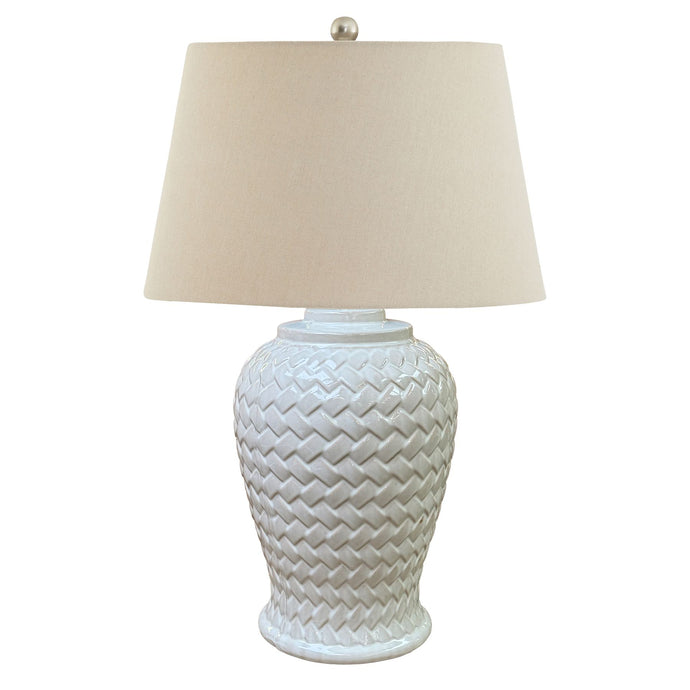 Woven Ceramic Table Lamp With Linen Shade in WHITE Hill Interiors 23058 5050140305881 Dimensions: 70cm x 40cm x 40cm Weight: 3.2kg Volume: 0.11CBM This is the Woven Ceramic Table Lamp With Linen Shade. A handcrafted ceramic lamp, in classically shaped design. This lamp's eye-catching woven pattern in a luxe, neutral green-tinged finish adds texture and subtle colour to any space. Arriving complete with ball-topped neutral linen shade, this lamp can be used to give any room an instant lift.