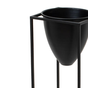 Large Matt Black Bullet Planter On Black Frame in BLACK Hill Interiors 23086 5050140308684 Dimensions: 80cm x 23cm x 23cm Weight: 1.48kg Volume: 0.05CBM This is the Large Black Bullet Planter On Black Frame, a unique and contemporary planter in style and features which is sure to bring an element of design and class into any interior. The black finsh and bullet shade is extremely on trend and when finished with a beautiful bundle of greenery it is sure to create an eye catching piece in any interior. At 80c