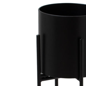 Matt Black Cylindrical Planter On Black Frame in BLACK Hill Interiors 23093 5050140309384 Dimensions: 72cm x 22cm x 22cm Weight: 1.7kg Volume: 0.04CBM