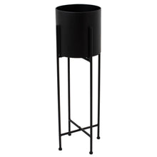 Load image into Gallery viewer, Large Matt Black Cylindrical Planter On Black Frame in BLACK Hill Interiors 23094 5050140309483 Dimensions: 84cm x 25cm x 25cm Weight: 2.04kg Volume: 0.07CBM Large Matt Black Cylindrical Planter On Black Frame