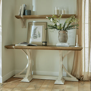 Luna Collection Console Table in WHITE Hill Interiors 23109 5050140310984 Dimensions: 80cm x 180cm x 50cm Weight: 30kg Volume: 0.91CBM This is the Luna Collection Console Table. Where rustic charm meets contemporary design, the furniture range boasts an off white painted bottom combined with a stained wooden top. It is carefully handcrafted by skilled artisans, highlighting a unique planked pine design enhanced by a warm mid-tone stain. The fusion of this earthy texture with popular white painted legs yield