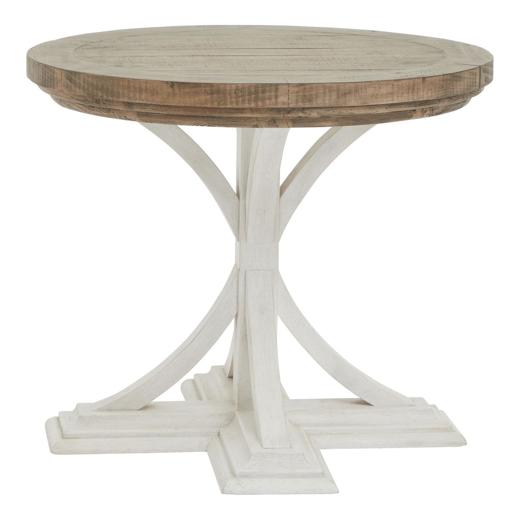 Luna Collection Round Occasional Table in WHITE Hill Interiors 23111 5050140311189 Dimensions: 60cm x 70cm x 70cm Weight: 12kg Volume: 0.37CBM This is the Luna Collection Round Occasional Table. Where rustic charm meets contemporary design, the furniture range boasts an off white painted bottom combined with a stained wooden top. It is carefully handcrafted by skilled artisans, highlighting a unique planked pine design enhanced by a warm mid-tone stain. The fusion of this earthy texture with popular white p
