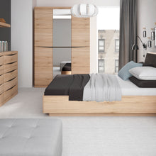 Load image into Gallery viewer, Kensington 4 + 4 Wide Chest of Drawers in Oak Furniture To Go 4034445 5900355033799 4 + 4 Wide Chest of Drawers in Oak. This fantastic grained oak finish with the contrasting dark trim makes this modern top quality collection of bedroom furniture the ideal destination for the most modern or traditional homes. Dimensions: 838mm x 1257mm x 399mm (Height x Width x Depth) 
 Laminated board ( resistant to damage and scratches, moisture and high temperature ) 
 Characteristic milled handles 
 Easy self assembly 
