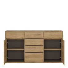 Load image into Gallery viewer, Shetland 2 door 6 drawer chest in Shetland Oak Finish Furniture To Go 4194161 5900355035939 2 door 6 drawer chest. Enchanting with its simple elegence, Ingenious shape complemented by elegant decor - a perfect marriage. This collection with sharp lines and a bold feeling, fills every living room space requirement. Dimensions: 868mm x 1560mm x 400mm (Height x Width x Depth) 
 Laminated board ( resistant to damage and scratches, moisture and high temperature ) 
 Easy self assembly 
 Modern handle free solutio