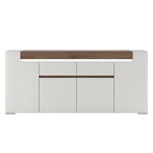 Load image into Gallery viewer, Toronto Wide 4 Door 2 Drawer Sideboard (inc. Plexi Lighting) In White and Oak Furniture To Go 4202544 5900355035588 Wide 4 Door 2 Drawer Sideboard (inc, Plexi Lighting). This extra wide 4 door 2 drawer sideboard has many features including soft close doors and drawers, internal LED lighting and adjustable shelves. Warm and yet cool living and dining collection in white High Gloss with San Remo Oak inset. Dimensions: 845mm x 1900mm x 422mm (Height x Width x Depth) 
 Laminated board ( resistant to damage and 