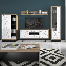 Load image into Gallery viewer, Brolo Wide 1 door bookcase in Walnut and White Furniture To Go 4341053 5900355059492 A bookcase with a single cupboard door in the signature Brolo design, as well as open shelving to display your most read, or maybe some of the more high-brow titles to impress guests! Dimensions: 1480mm x 854mm x 370mm (Height x Width x Depth) 
 Laminated board (resistant to damage and scratches, moisture and high temperature) 
 Adjustable hinges on all doors with soft closes 
 Easy self assembly 
 Assembly instructions:
 
