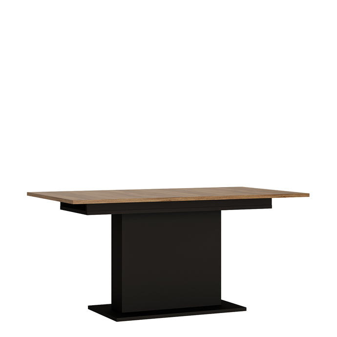 Brolo Extending Dining table in Walnut and Black Furniture To Go 4347553 5900355059522 With the modern design of a central pillar rather than corner legs, this table fits in with the contemporary Brolo range perfectly – it even has the option of extending from 160cm to 200cm when necessary, adding versatility and convenience to its list of plus points. Dimensions: 762mm x 1600-2000mm x 900mm (Height x Width x Depth) 
 Laminated board (resistant to damage and scratches, moisture and high temperature) 
 Easy 