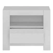 Load image into Gallery viewer, Novi 1 Drawer Bedside Table in Alpine White Furniture To Go 4371420 5900355114450 The Novi Collection is a simple, elegant range with a timeless appeal that will ensure a modern look regardless of any changing trends. The smooth surface of the white fronts has been broken up with millings of the same colour, creating the hallmark of the entire collection. Traditional handles have been replaced by a comfortable, handleless system. Fully extendable drawers, synchronous slides in the table and high quality, ma