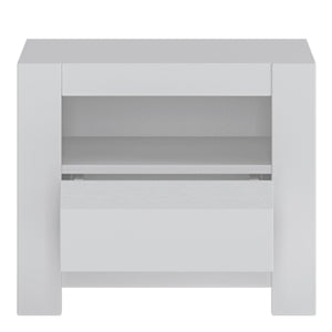 Novi 1 Drawer Bedside Table in Alpine White Furniture To Go 4371420 5900355114450 The Novi Collection is a simple, elegant range with a timeless appeal that will ensure a modern look regardless of any changing trends. The smooth surface of the white fronts has been broken up with millings of the same colour, creating the hallmark of the entire collection. Traditional handles have been replaced by a comfortable, handleless system. Fully extendable drawers, synchronous slides in the table and high quality, ma