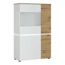 Load image into Gallery viewer, Luci 4 door low display cabinet (including LED lighting) in White and Oak Furniture To Go 4380470 5900355115075 The simplicity of the piece and combination of trendy colours adds timeless style to the Luci collection. This modern vitrine features eight compartments, which are perfect for storage. The vitrine has an ergonomic handleless solution, soft-close accessories and tempered glass – this combination gives you convenience and safety. The Luci collection features integrated lighting (included), which ma