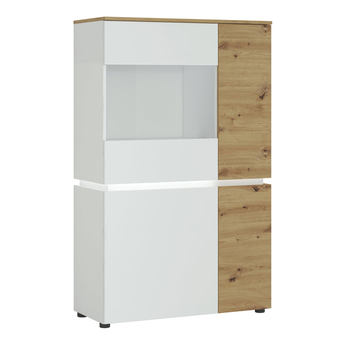 Luci 4 door low display cabinet (including LED lighting) in White and Oak Furniture To Go 4380470 5900355115075 The simplicity of the piece and combination of trendy colours adds timeless style to the Luci collection. This modern vitrine features eight compartments, which are perfect for storage. The vitrine has an ergonomic handleless solution, soft-close accessories and tempered glass – this combination gives you convenience and safety. The Luci collection features integrated lighting (included), which ma