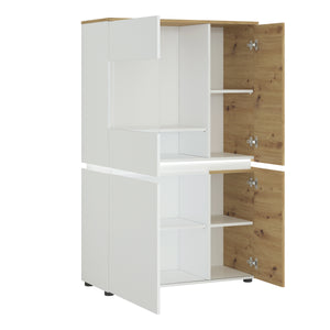 Luci 4 door low display cabinet (including LED lighting) in White and Oak Furniture To Go 4380470 5900355115075 The simplicity of the piece and combination of trendy colours adds timeless style to the Luci collection. This modern vitrine features eight compartments, which are perfect for storage. The vitrine has an ergonomic handleless solution, soft-close accessories and tempered glass – this combination gives you convenience and safety. The Luci collection features integrated lighting (included), which ma