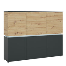 Load image into Gallery viewer, Luci 6 door cabinet (including LED lighting) in Platinum and Oak Furniture To Go 4390571 5900355117550 A simple form, subdued colors, combination of modern design with timeless comfort make the chest of drawers ideally suited to interiors decorated in a minimalist or modern style .
The interior of the high chest of drawers is divided into 4 parts, which hide shelves behind closed fronts. Even in a standalone option, this furniture will perfectly complement the space, and in combination with other elements o