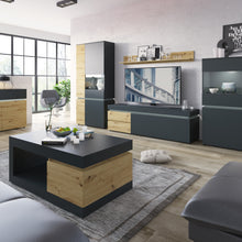 Load image into Gallery viewer, Luci 1 door 2 drawer 180 cm wide TV unit (including LED lighting) in Platinum and Oak Furniture To Go 4390871 5900355117581 The RTV chest of drawers from the Luci collection has two spacious drawers with full extension inside and two recesses behind the flap, which allow you to keep the living room tidy. A 180 cm long table top will allow you to display your favorite RTV equipment. The contrasting combination of the Gray Cosmos decor with the Artisan Oak decor adds a touch of life and freshness to the inter