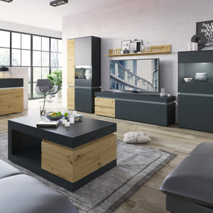 Luci 1 door 2 drawer 180 cm wide TV unit (including LED lighting) in Platinum and Oak Furniture To Go 4390871 5900355117581 The RTV chest of drawers from the Luci collection has two spacious drawers with full extension inside and two recesses behind the flap, which allow you to keep the living room tidy. A 180 cm long table top will allow you to display your favorite RTV equipment. The contrasting combination of the Gray Cosmos decor with the Artisan Oak decor adds a touch of life and freshness to the inter