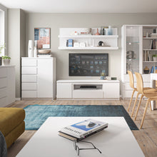Load image into Gallery viewer, Fribo 1 door 5 drawer cabinet in White Furniture To Go 4400501 5900355132331 A high chest of drawers with drawers takes up little space, yet it is roomy - an ideal piece of furniture for small interiors. There are five drawers and three hidden spaces behind the front. The white chest of drawers has been equipped with practical furniture accessories in the form of drawers with full extension , as well as a handle-free system that is convenient to use. The chest of drawers from the Fribo collection deserves r