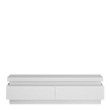 Load image into Gallery viewer, Lyon 2 drawer TV cabinet (including LED lighting) in White and High Gloss Furniture To Go 4440122 5900355143351 Generous 146cm wide TV cabinet, wide enough for the latest TV&#39;s. Plenty of storage in the easy gliding drawers. Includes a concealed lighting arrangement. The designers of this range have combined several rectangular shapes and produced a modern collection in 3 different colourways, Riviera light oak and white high gloss fronts, contrasting greys and white and gloss white. Dimensions: 417mm x 1461