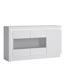 Load image into Gallery viewer, Lyon 3 door glazed sideboard (including LED lighting) in White and High Gloss Furniture To Go 4440422 5900355143382 This could be the signature piece in your living or dining area. Perfect for showcasing your most prized photographs or ornaments. Plenty of space is included behind the 3 doors. Includes a concealed lighting arrangement. The designers of this range have combined several rectangular shapes and produced a modern collection in 3 different colourways, Riviera light oak and white high gloss fronts