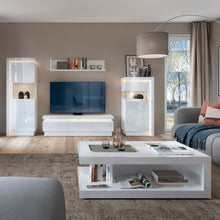 Load image into Gallery viewer, Lyon Bookcase (LH) in White and High Gloss Furniture To Go 4441922 5900355143528 This bookcase has plenty of space to display family treasures or your favourite book collection. Left hand orientation. The designers of this range have combined several rectangular shapes and produced a modern collection in 3 different colourways, Riviera light oak and white high gloss fronts, contrasting greys and white and gloss white. Dimensions: 1985mm x 600mm x 420mm (Height x Width x Depth) 
 Laminated board (resistant t