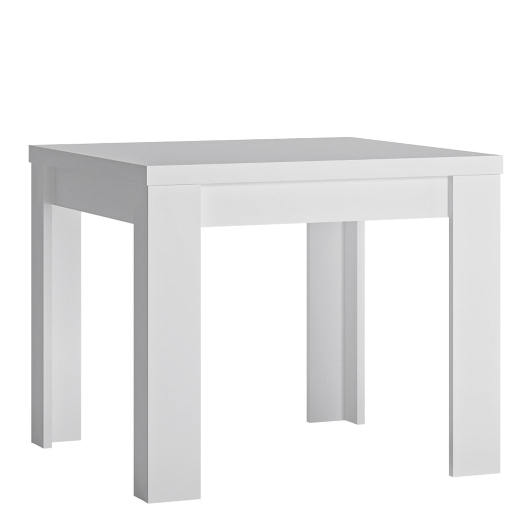 Lyon Small extending Dining Table 90/180 cm in White and High Gloss Furniture To Go 4447522 5900355143580 Small extending dining table 90/180cm in White and Gloss White. This beautifully designed table comes in 3 different sizes. A great edition to any dining room, perfectly matched with other items in the same collection. A beautiful Matt table top with white high gloss sides. Dimensions: 765mm x 900-1800mm x 900mm (Height x Width x Depth) 
 Laminated board (resistant to moisture and damage) 
 Available in