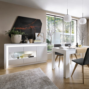 Lyon Small extending Dining Table 90/180 cm in White and High Gloss Furniture To Go 4447522 5900355143580 Small extending dining table 90/180cm in White and Gloss White. This beautifully designed table comes in 3 different sizes. A great edition to any dining room, perfectly matched with other items in the same collection. A beautiful Matt table top with white high gloss sides. Dimensions: 765mm x 900-1800mm x 900mm (Height x Width x Depth) 
 Laminated board (resistant to moisture and damage) 
 Available in