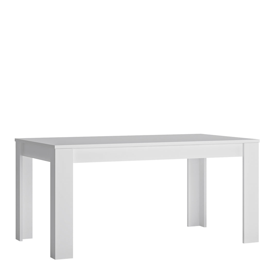Lyon Large extending dining table 160/200 cm in White and High Gloss Furniture To Go 4447722 5900355143573 Large extending dining table 160/200cm in White and Gloss White. This beautifully designed table comes in 3 different sizes. A great edition to any dining room, perfectly matched with other items in the same collection. A beautiful Matt table top with white high gloss sides. Dimensions: 766mm x 1600-2000mm x 900mm (Height x Width x Depth) 
 Laminated board (resistant to moisture and damage) 
 Available
