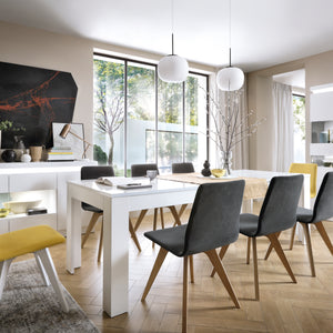 Lyon Large extending dining table 160/200 cm in White and High Gloss Furniture To Go 4447722 5900355143573 Large extending dining table 160/200cm in White and Gloss White. This beautifully designed table comes in 3 different sizes. A great edition to any dining room, perfectly matched with other items in the same collection. A beautiful Matt table top with white high gloss sides. Dimensions: 766mm x 1600-2000mm x 900mm (Height x Width x Depth) 
 Laminated board (resistant to moisture and damage) 
 Available