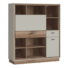 Load image into Gallery viewer, Rivero Bookcase with Fold out Desk in Grey and Oak Furniture To Go 4465880 5900355153756 A piece of furniture that will work great in the living room, but can also be used to create a comfortable place to work at home. The ingenious interior design works especially well in small rooms. If you are looking for multifunctional furniture with compact dimensions and extraordinary utility advantages, the unconventional bookcase from the Rivero series will surely appeal to you. This piece of furniture can be descr