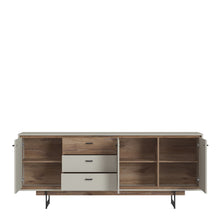 Load image into Gallery viewer, Rivero 3 Door 3 Drawer Wide Sideboard in Grey and Oak Furniture To Go 4466180 5900355153725 The living room and dining room are a space where you can spend time with your loved ones. Daily relaxation, shared meals with the family, as well as parties and feasts in the company of friends are special moments that require reliable and stylish room equipment. As part of the tasteful Rivero series, dedicated to the living room and dining room, there is an extremely spacious sideboard with drawers and full fronts,