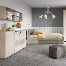 Load image into Gallery viewer, Denim 90cm Headboard extension in Light Walnut Furniture To Go 4477059 5900355153916 Are you wondering how to increase the functionality of the bed in a children&#39;s or youth&#39;s room? For the 90 cm wide single bed, you can install a practical, modern-looking headboard storage extension, thanks to which, without limiting the space around the bed, you can significantly increase the comfort of falling asleep every day.
The extension, which is mounted to the headboard, is made of laminated chipboard, resistant to 