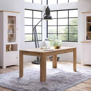 Celesto Dining Table in Oak Furniture To Go 4487554 5900355160280 The Celesto range is traditional style at its best. Perfect for modern or traditional homes. With a contemporary style in mind the Celesto range has been designed to bring a beautiful modern country touch into your home. This minimalist table offers a spacious table top to add to the rustic charm of your dining room and extends to 2 meters when required. Dimensions: 766mm x 1600-2000mm x 900mm (Height x Width x Depth) 
 Country design 
 Exten